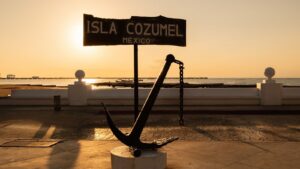 Cozumel Malecón anchor at sunset within walking distance of Distrito Centro 602 vacation rental