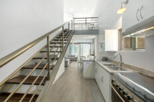 Interior staircase leading to the upper-level bedroom at Sophie’s Loft in Cozumel