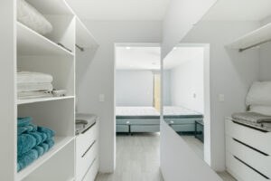 Walk-in closet in the upper-level bedroom at Sophie’s Loft, a furnished loft for sale in Cozumel