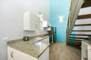 Modern equipped kitchen at Sophie’s Loft, a furnished loft for sale in Cozumel